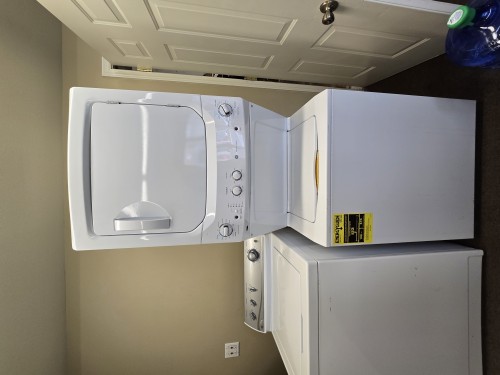 Refurbished GE Unibody top loader washer and electric dryer set