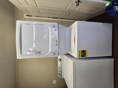 Refurbished GE Unibody top loader washer and electric dryer set